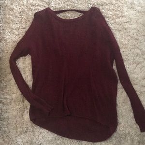 Maroon sweater with cut out detail on back